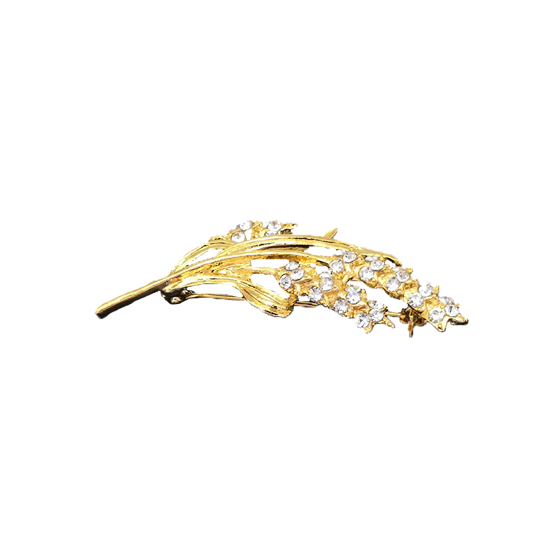 Broche de oro de trigo